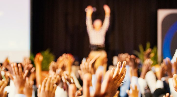 crowd with hands up