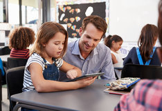 teacher working with child